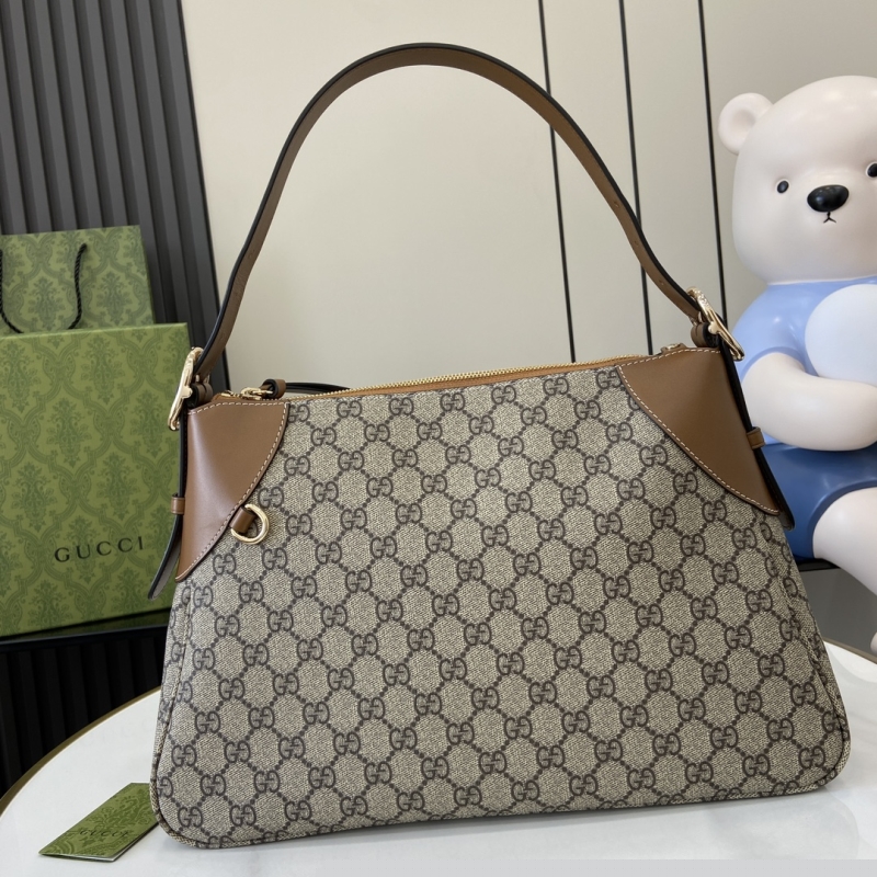 G*u*i shopping bags